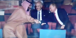 World Cup: two men smiling and shaking hands in the inaugural game