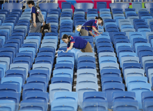 World Cup: 3 Japanese fans cleaning up the stadium after a winning match against Colombia